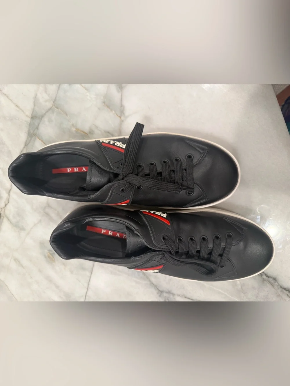 Prada Black Leather Sneakers with Red Stripe and White Sole